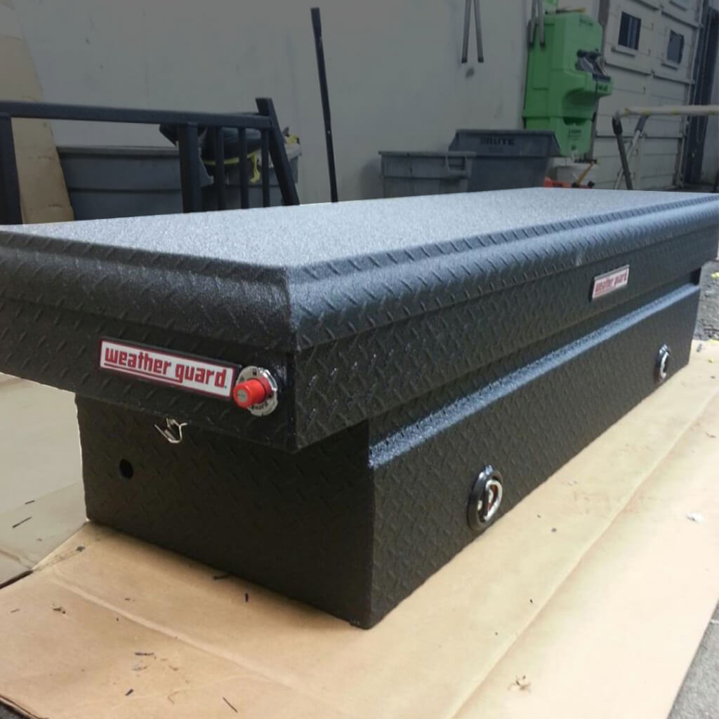 truck weather guard tool box with armaguard bedliner on it