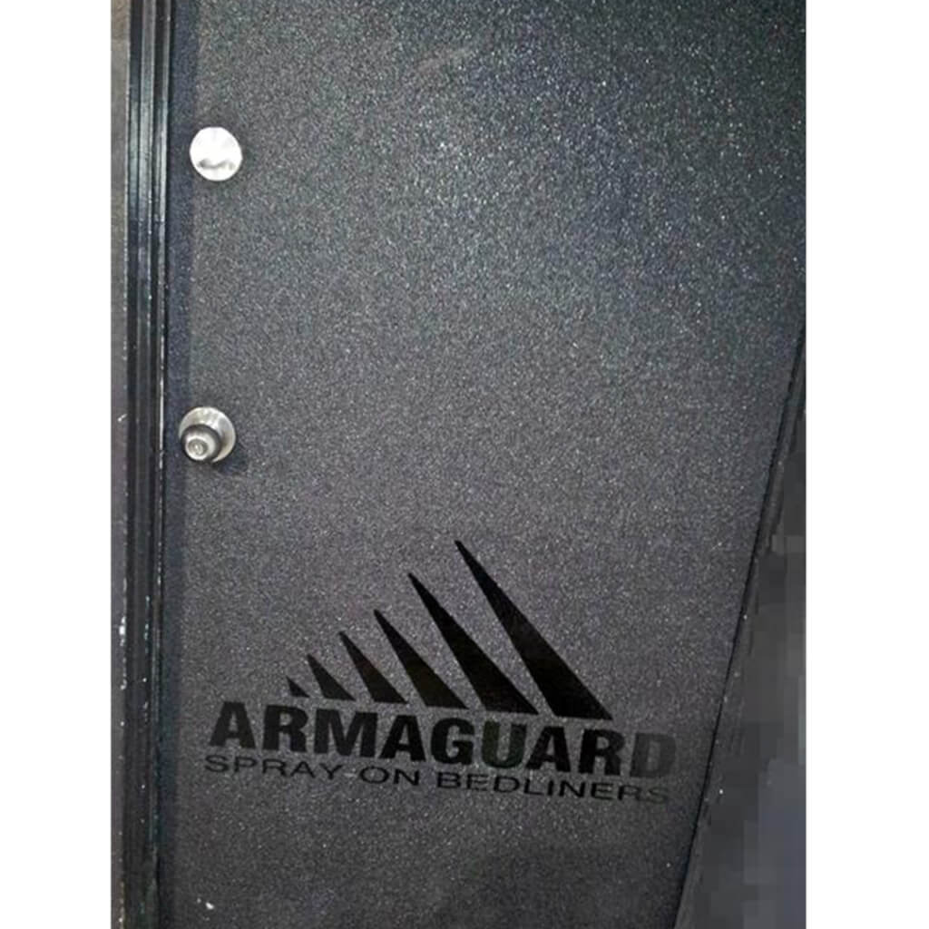 grey door with armaguard bedliner spray on it and the armaguard logo