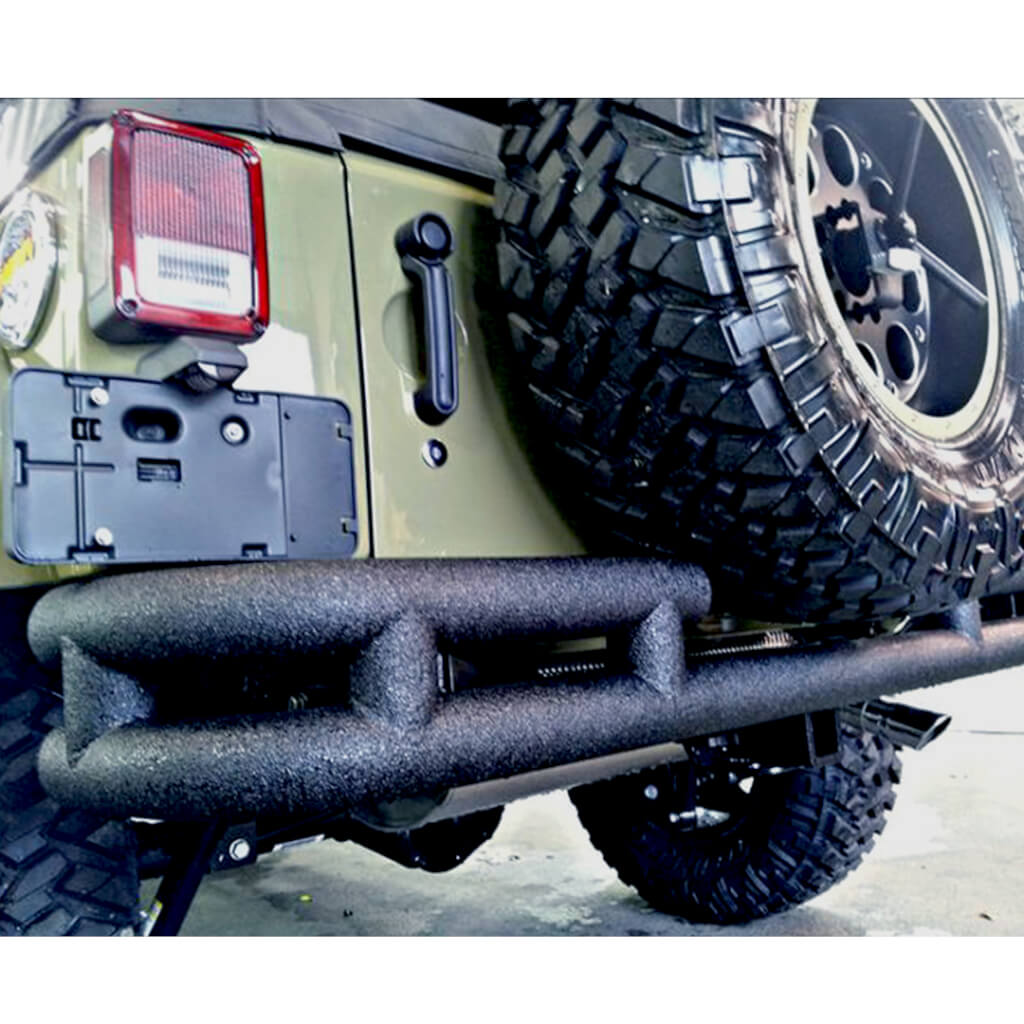 grey jeep bumper with armaguard bedliner on it