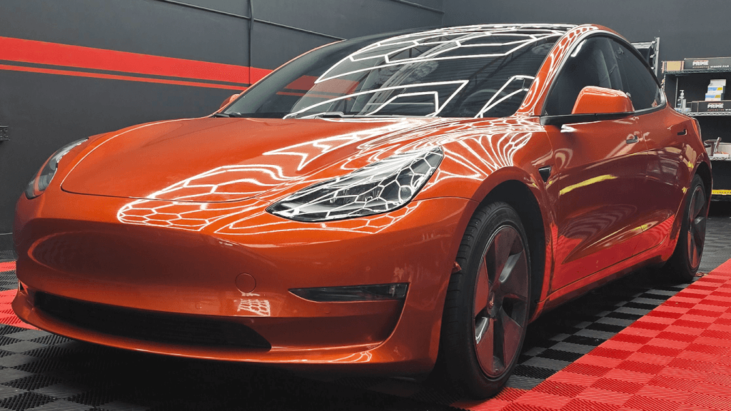 orange tesla model 3